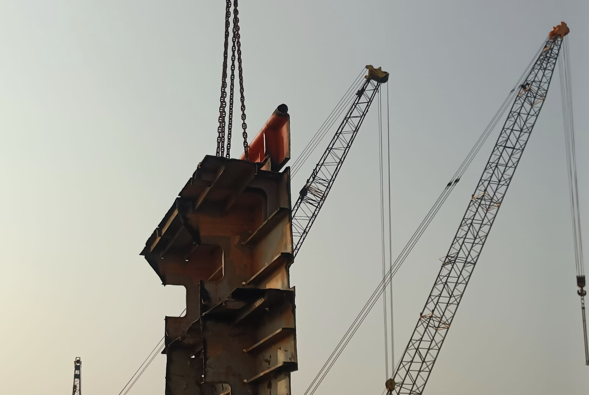 Block being lifted from Bow Faith, during to dismantling process.